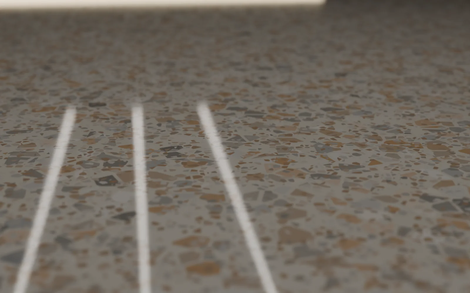 Terrazzo zeminde renkli mermer agregalar, alçak açıdan yakın plan