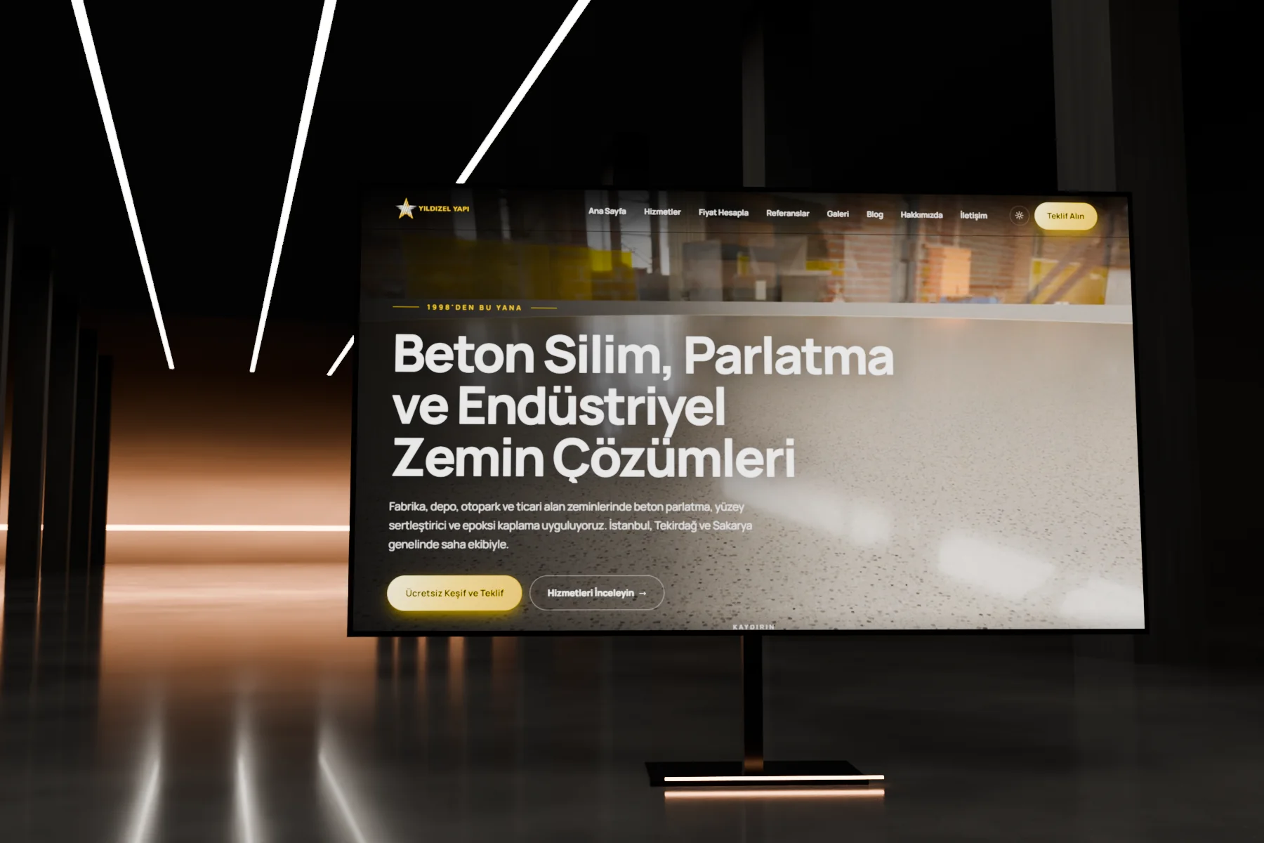 Parlatılmış beton showroomda, ekranda Yıldızel Yapı için yaptığımız web sitesi